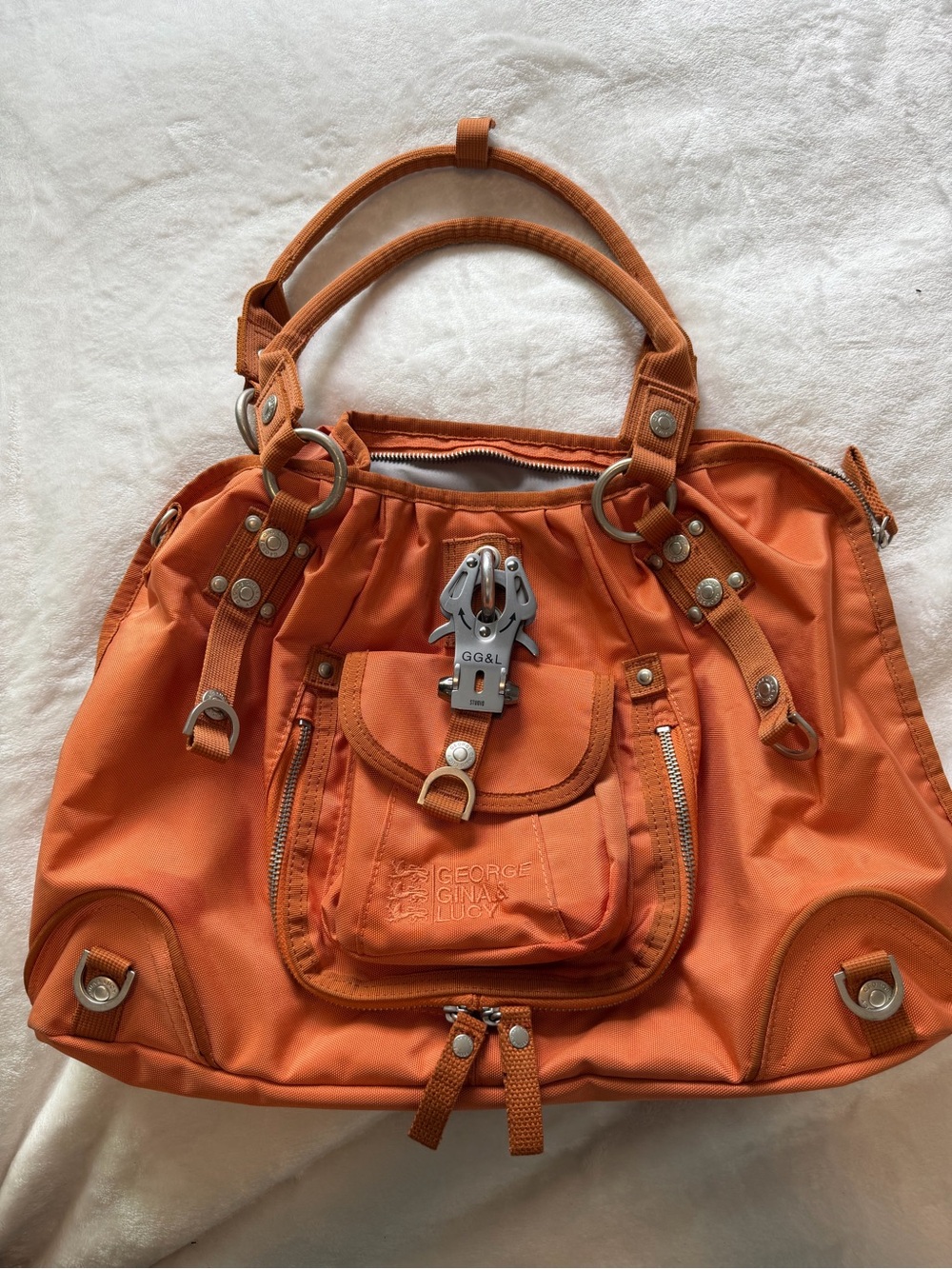 George Gina & Lucy featuring their signature metal carabiner clip